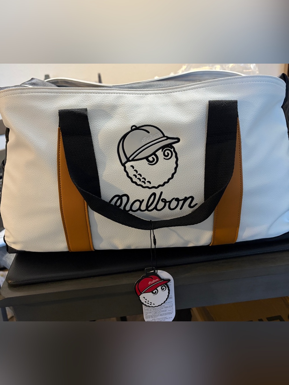 Malbon Duffel Bag Black, White, Brown.